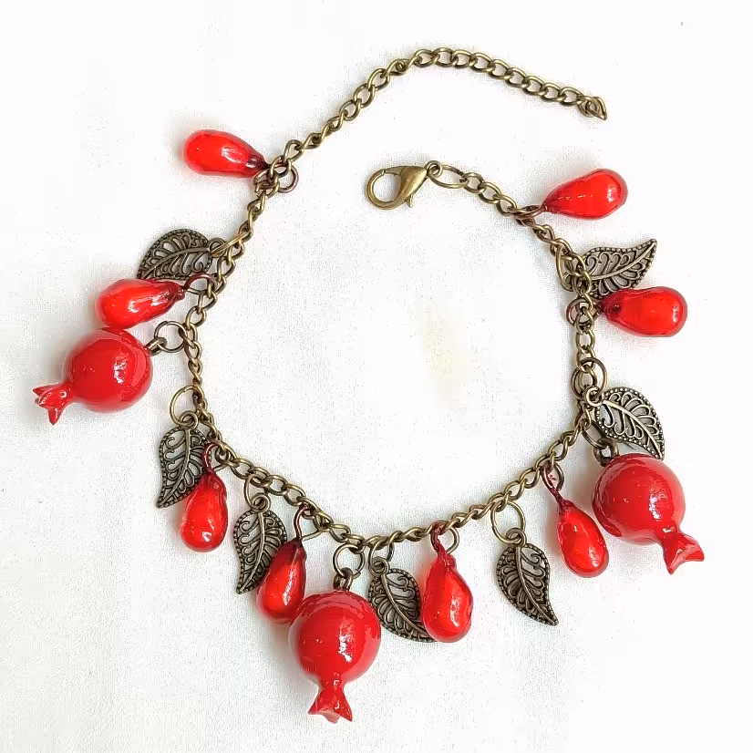 دستبند انار یلدا یلدایی دانه انار  رنگ ثابت نشکن برنزی بدلیجات یلدا زیورآلات یلدا