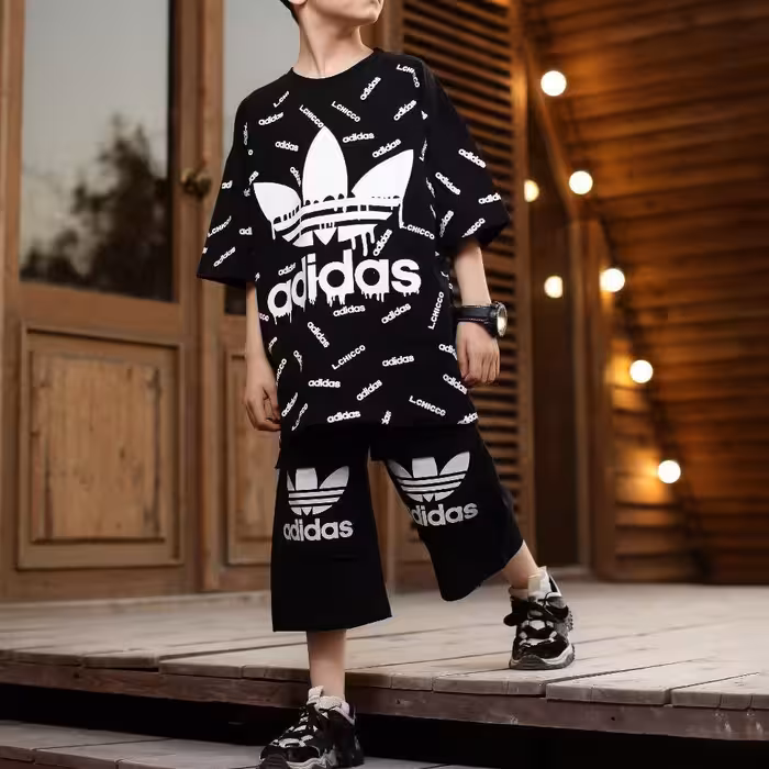 ست تیشرت و شلوارک اسپرت مشکی آدیداس سایز 45 تا 60 مناسب دختر و پسر 