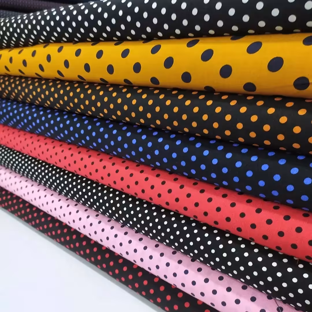 پارچه نخی معروف به نخ دوبی  طرح توپ توپی ریز و درشت