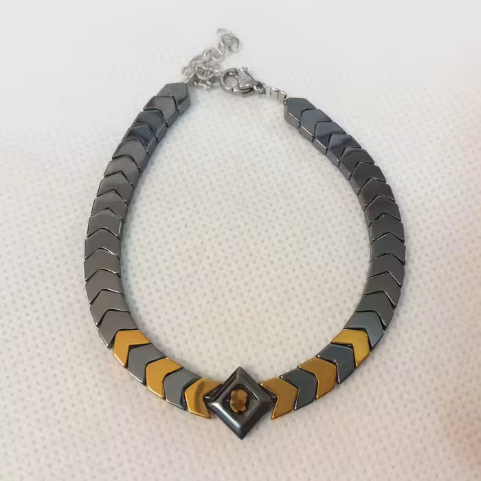 دستبند حدید فلش طلایی و دودی لوزی