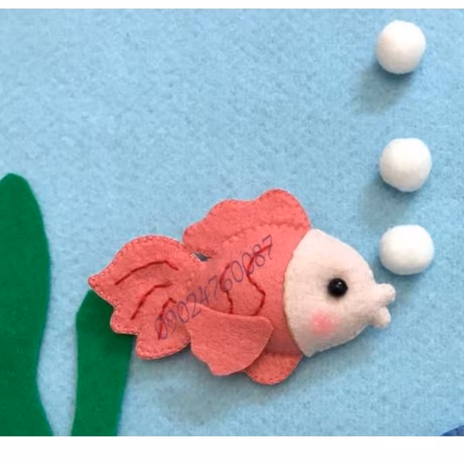 عروسک ماهی نمدی صورتی