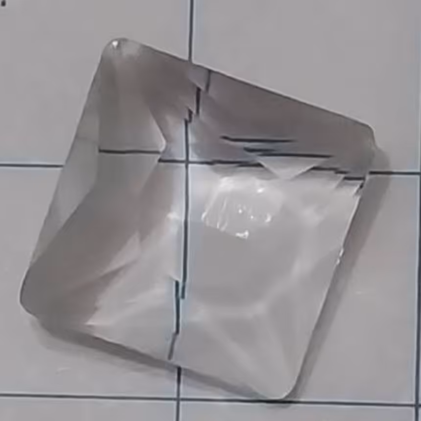 نگین زیرکن کریستالی سنتاتیک بی رنگ