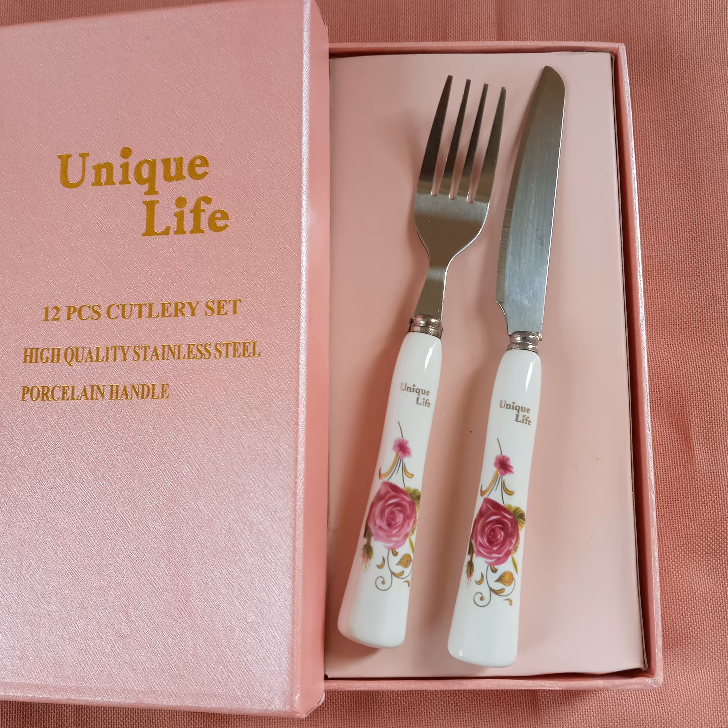 کارد و چنگال سرامیکی  12 عددی دسته سرامیکی مارک یونیک لایف صورتی  6 عدد چنگال و 6 عدد کارد 