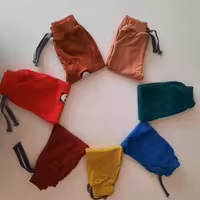 شلوار اسلش پسرانه دخترانه نقلی بچگانه شلوار بندی شلوار کمر کشی طرح پاندا گرم و بادوام سایز 40و45