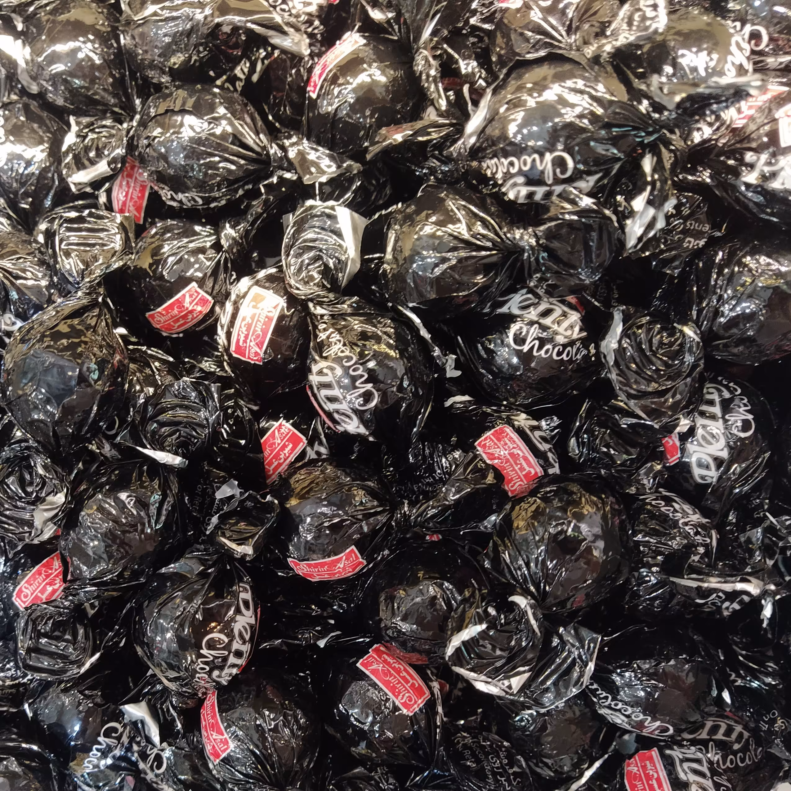 شکلات توپی فندقی پلنتی تلخ (250 گرم)