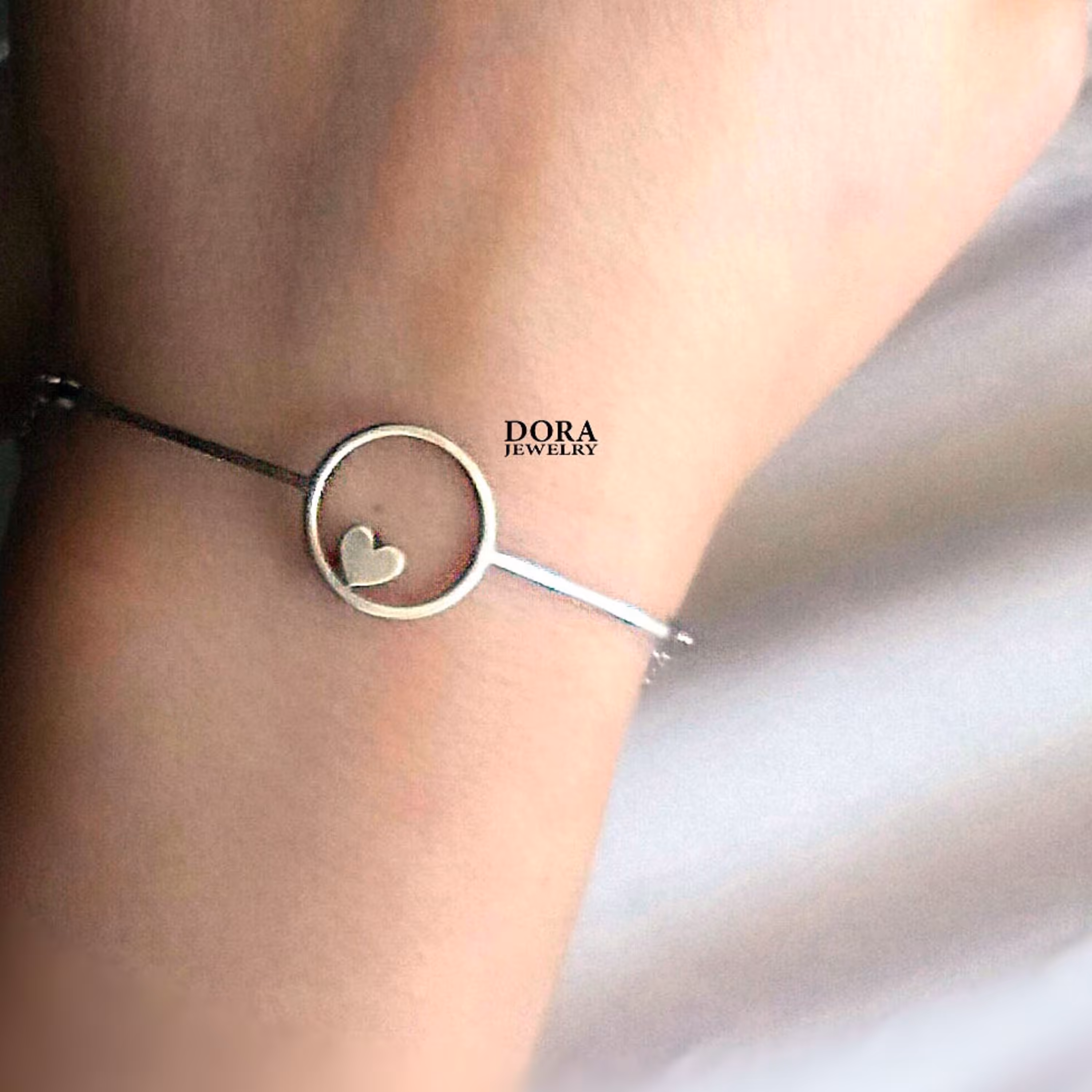 دستبند نقره طرح قلب و دایره