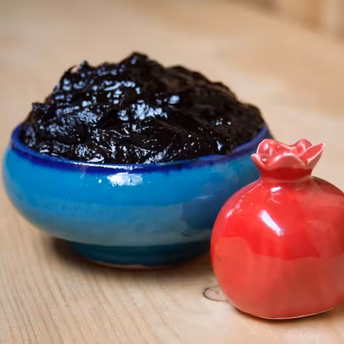 رب انار ارگانیک برگرفته از انارهای باغات ساوه  کاملا محلی و ارگانیک با تضمین 100 درصد ارگانیک و خالص