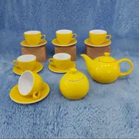 ست 16 پارچه چای خوری زرد چینی مقصود با جعبه بسیار شیک