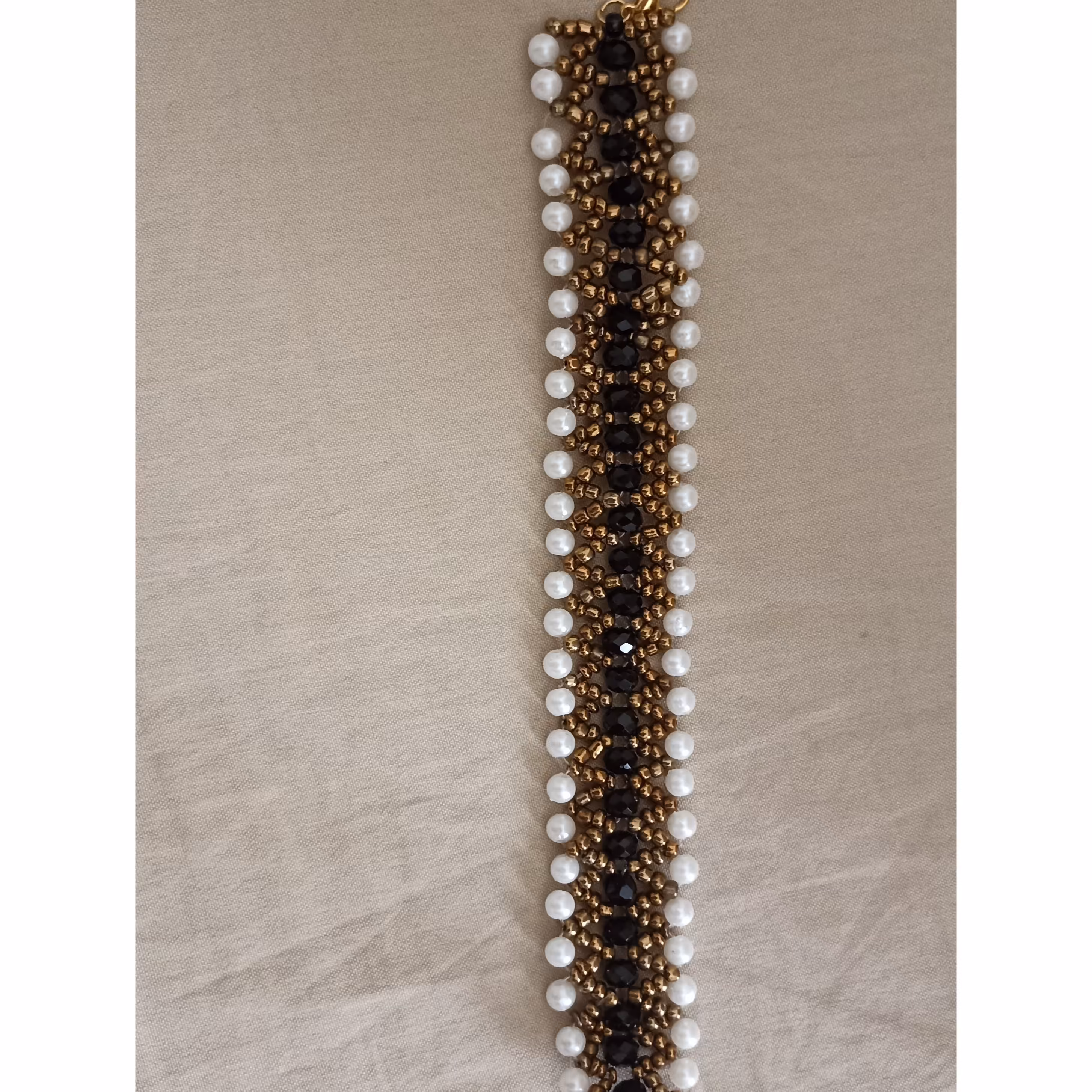 دستبند مرواریدی سه ردیفی خیلی زیبا