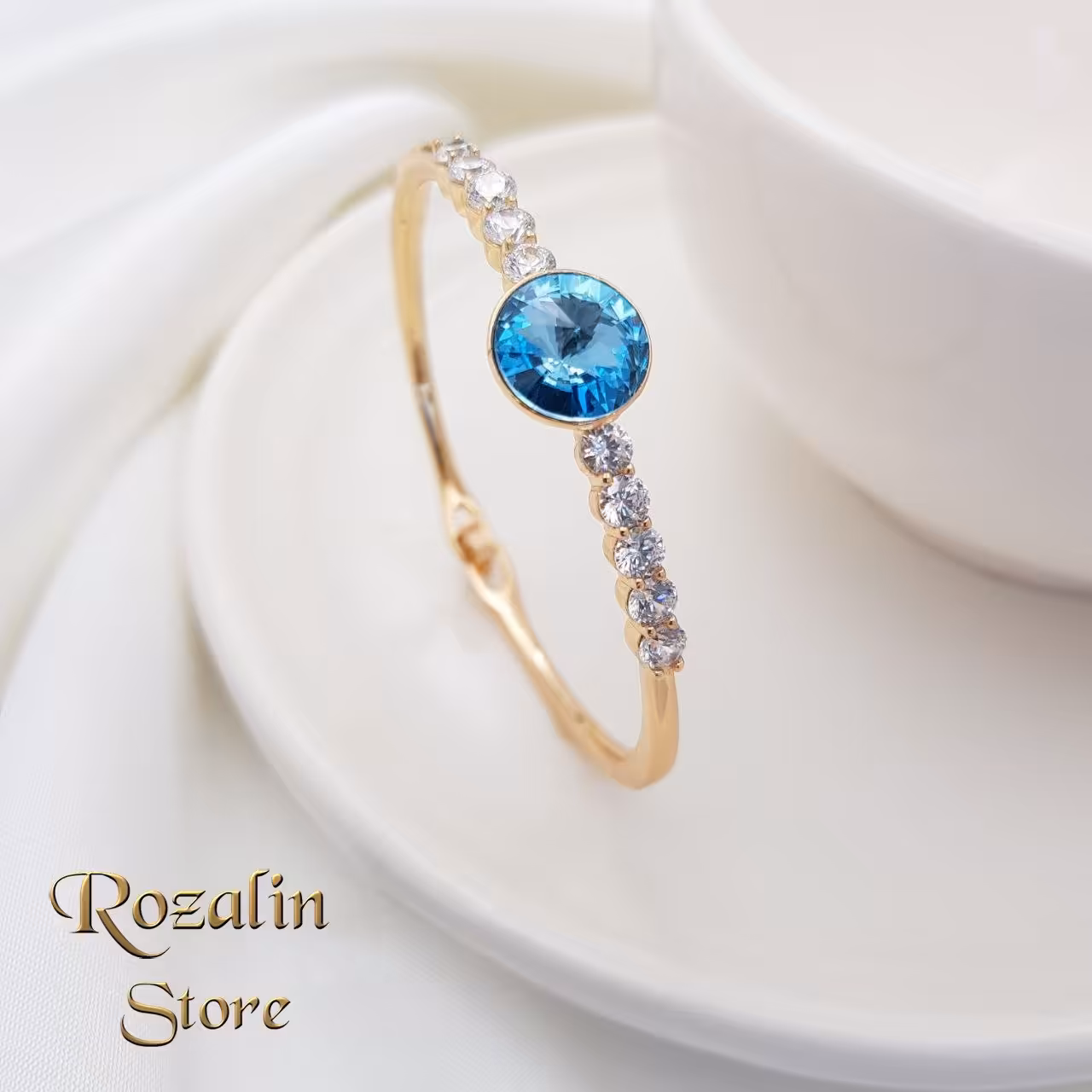 دستبند النگویی زنانه ژوپینگ نگین سواروسکی آبی باز شو