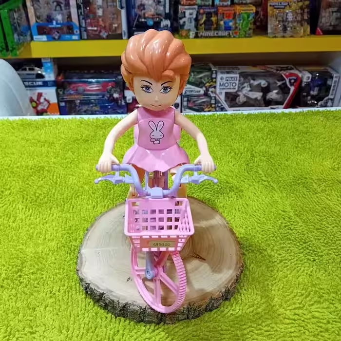 اسباب بازی عروسک موزیکال حرکتی دختر دوچرخه سوار