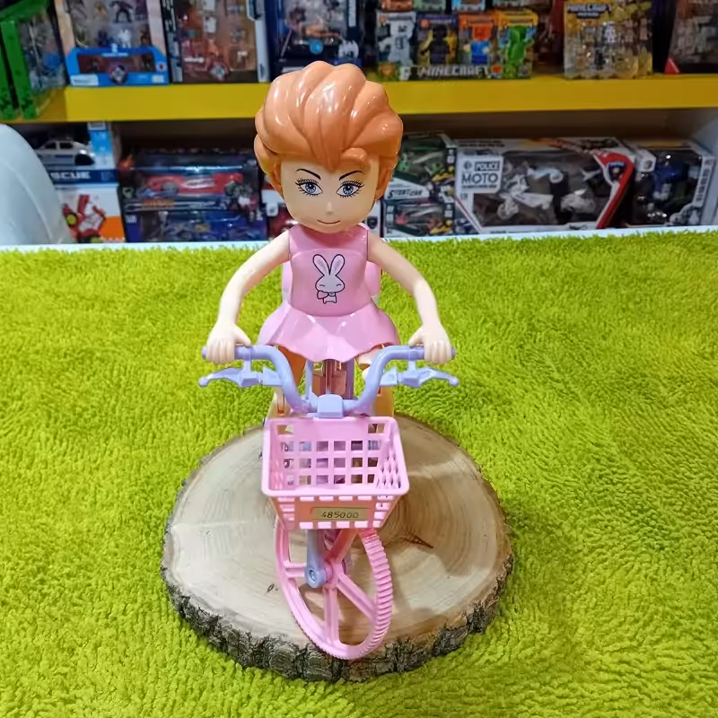 اسباب بازی عروسک موزیکال حرکتی دختر دوچرخه سوار