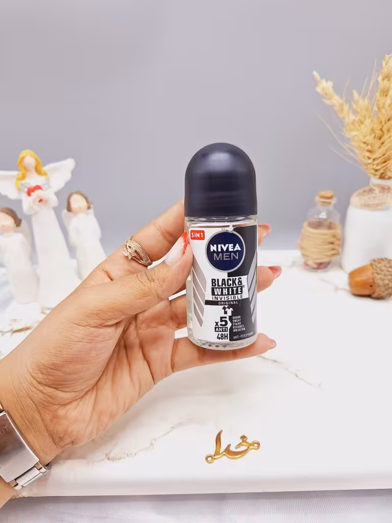 مام رول ضد تعریق مردانه نیوآ مدل Black & White Invisible Original حجم 50 میل کد 6162