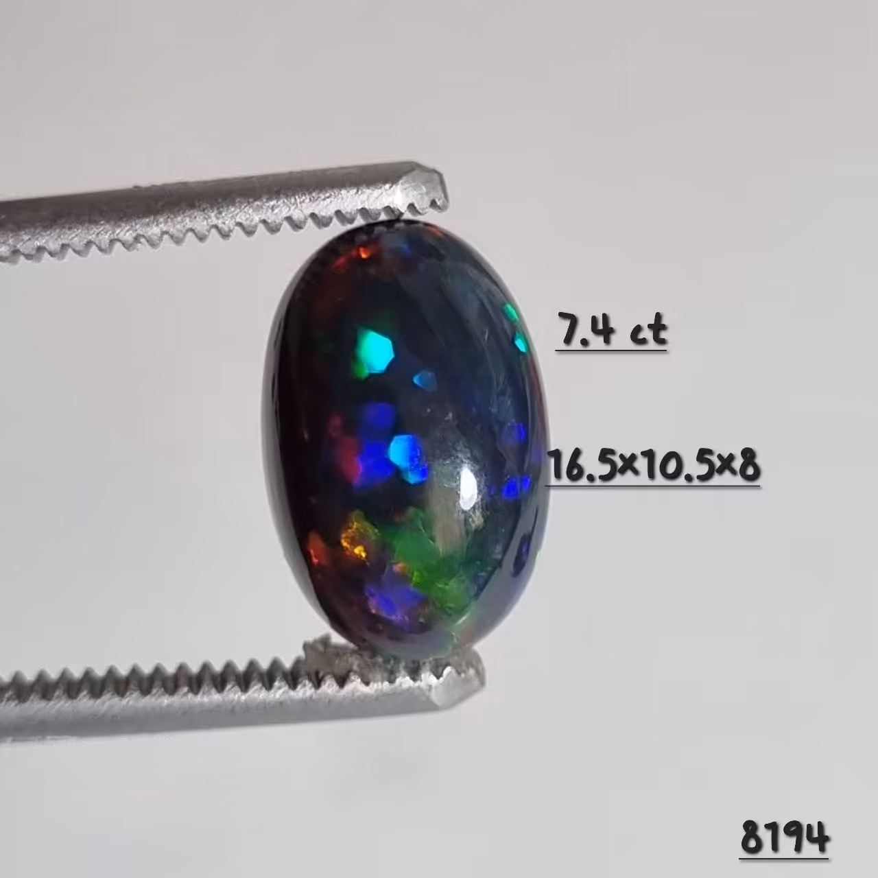 نگین اوپال سیاه اتیوپی هفت رنگ وزن 7.4 قیراط کد 8194