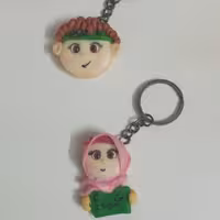 سرکلیدی و پیکسل طرح دختر و پسر ساخته شده از خمیر ایتالیایی مناسب هدیه عید غدیر