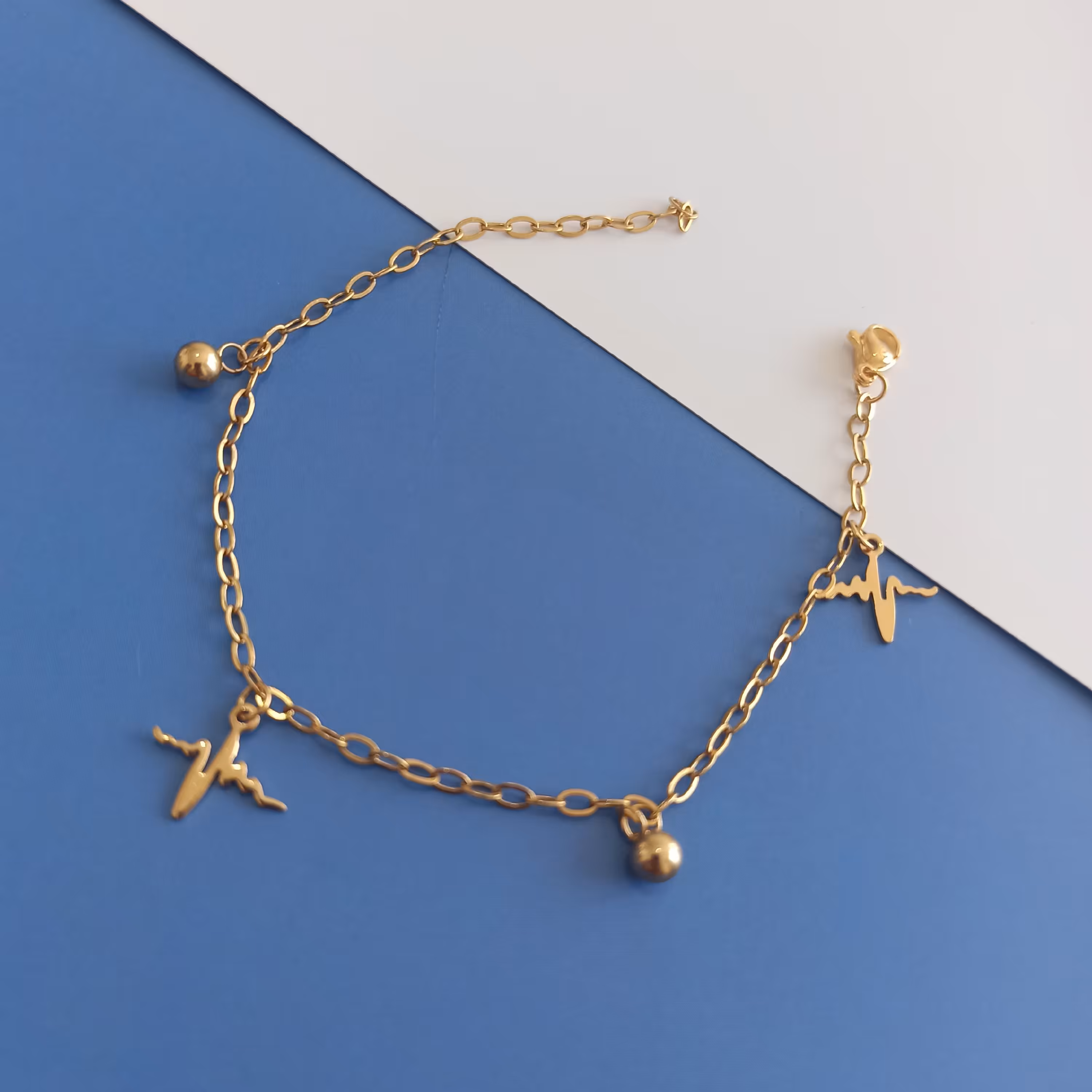 دستبند تمام استیل طلایی طرح ضربان قلب ، رنگ ثابت 