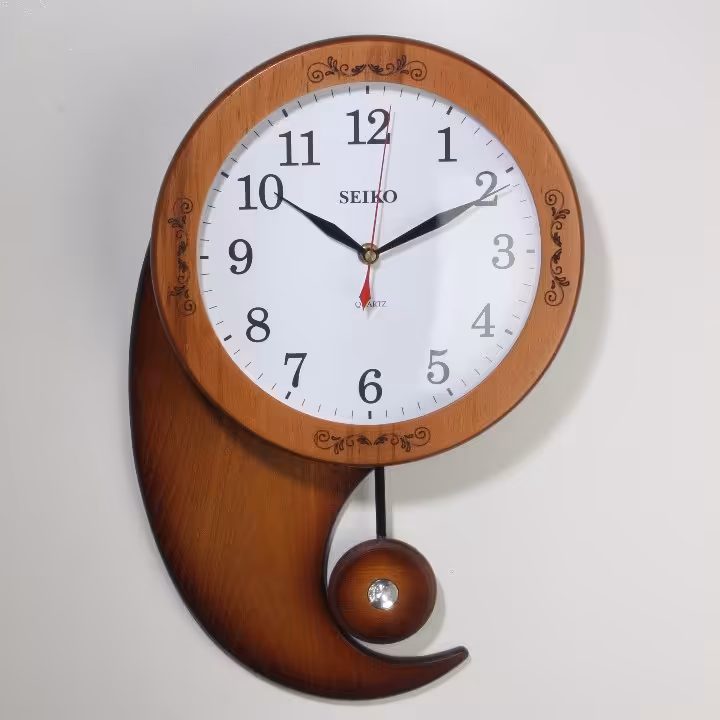 ساعت دیواری سیکو چوبی طرح بته جقه