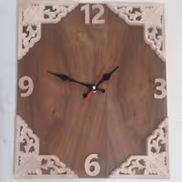 ساعت چوبی دیواری
ساعت چوبی منبت کاری شده 
ساعت دیواری