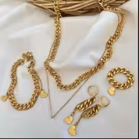 ست کارتیر  استیل با اویز قلب ، رنگ ثابت تضمینی،ارسال رایگان،مناسب استفاده روزانه ، مناسب هدیه ،بدلیجات استیل