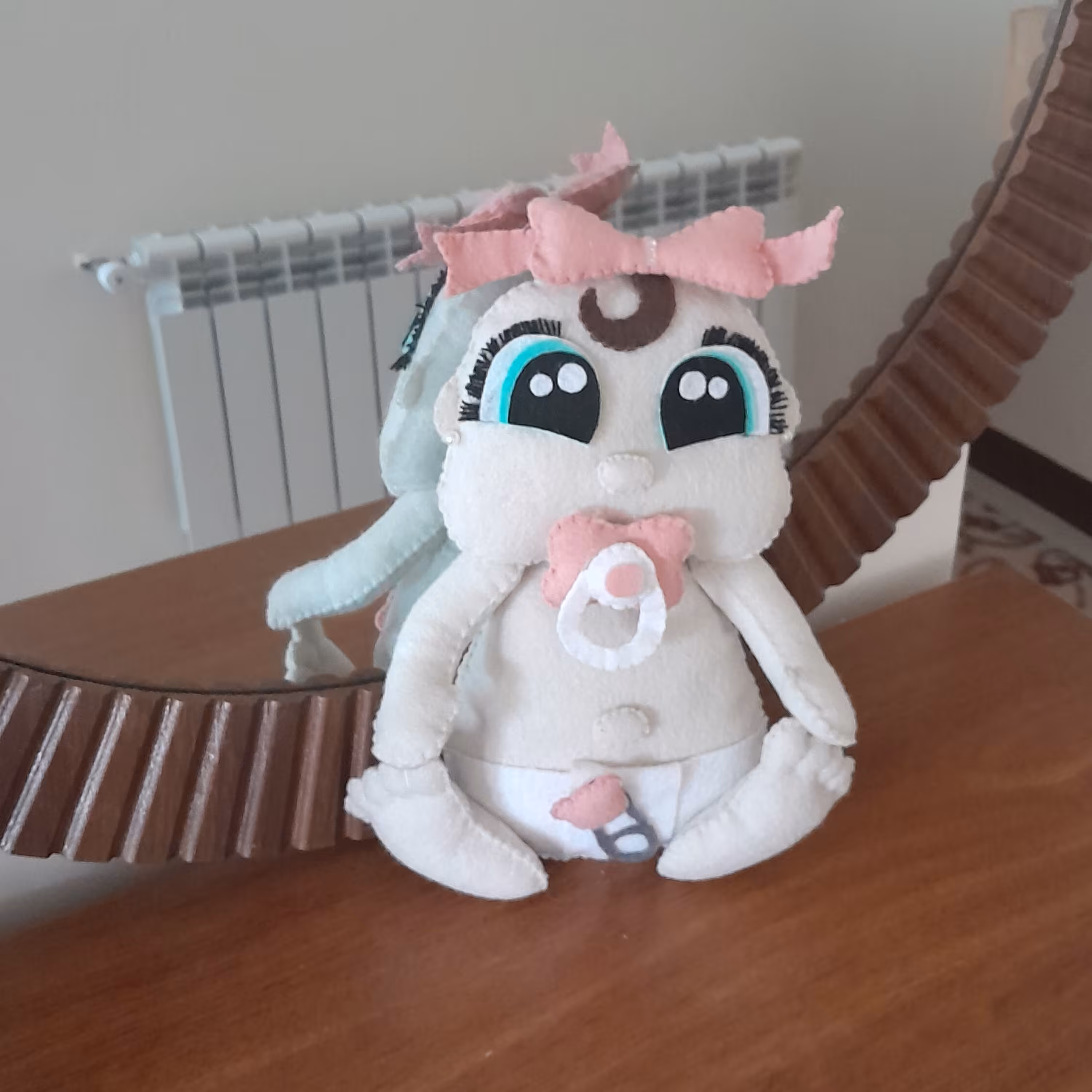 عروسک نی نی نمدی