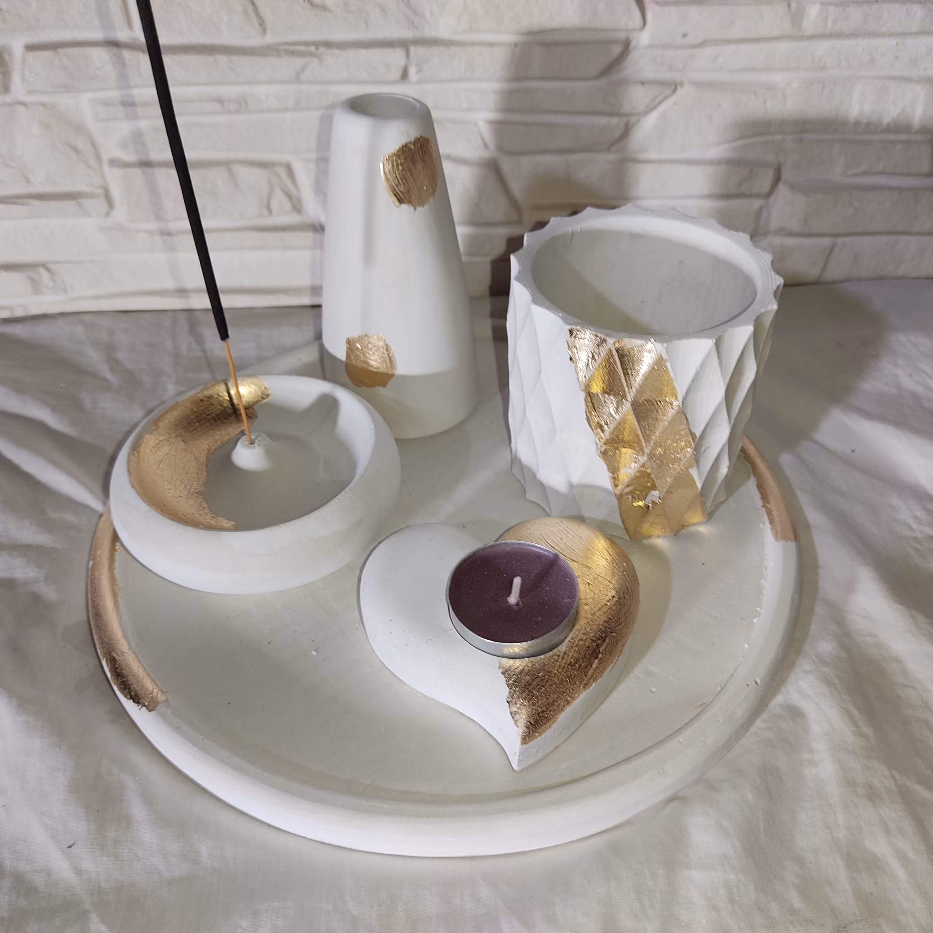 دکوری سنگی.اکسسوری.دکوری بتنی.سنگ مصنوعی.مجسمه.جاشمعی.جا عودی