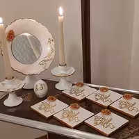 هفت سین ، شامل آیینه و شمعدان و 6 ظرف ، جنس سفال و ظروف به صورت چهارگوش و دایره
