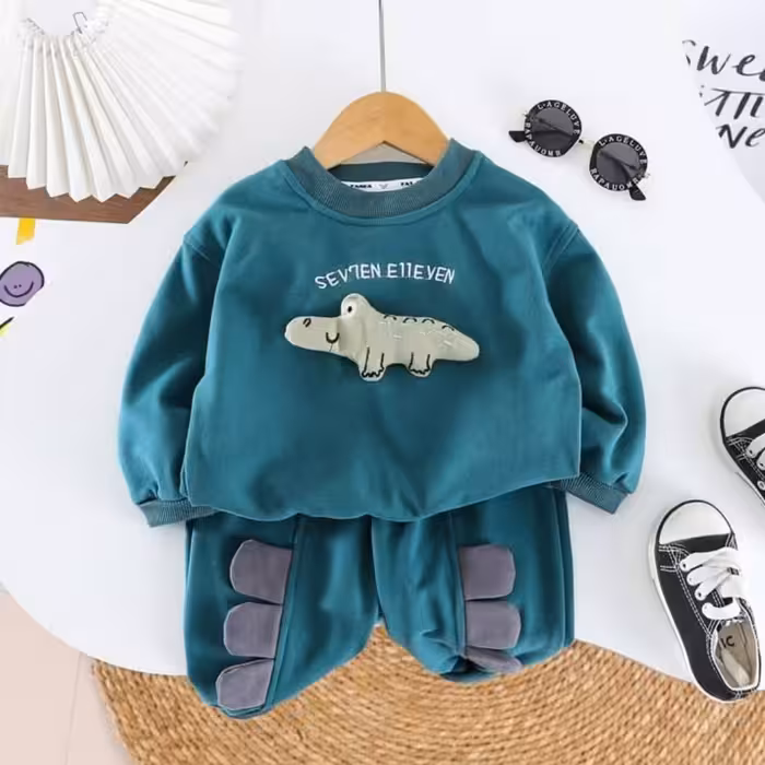 ست دوتیکه وارداتی کیفیت تضمینی بلوز و شلوار اسپورت جنس دورس دو رنگ سفید و سبز  مناسب حدود سنی 1 تا 5 سال شیک و زیبا 