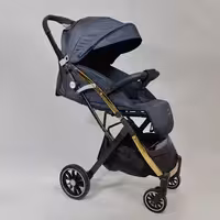 کالسکه خلبانی بیبی استار چرخ بزرگ بدنه طلایی