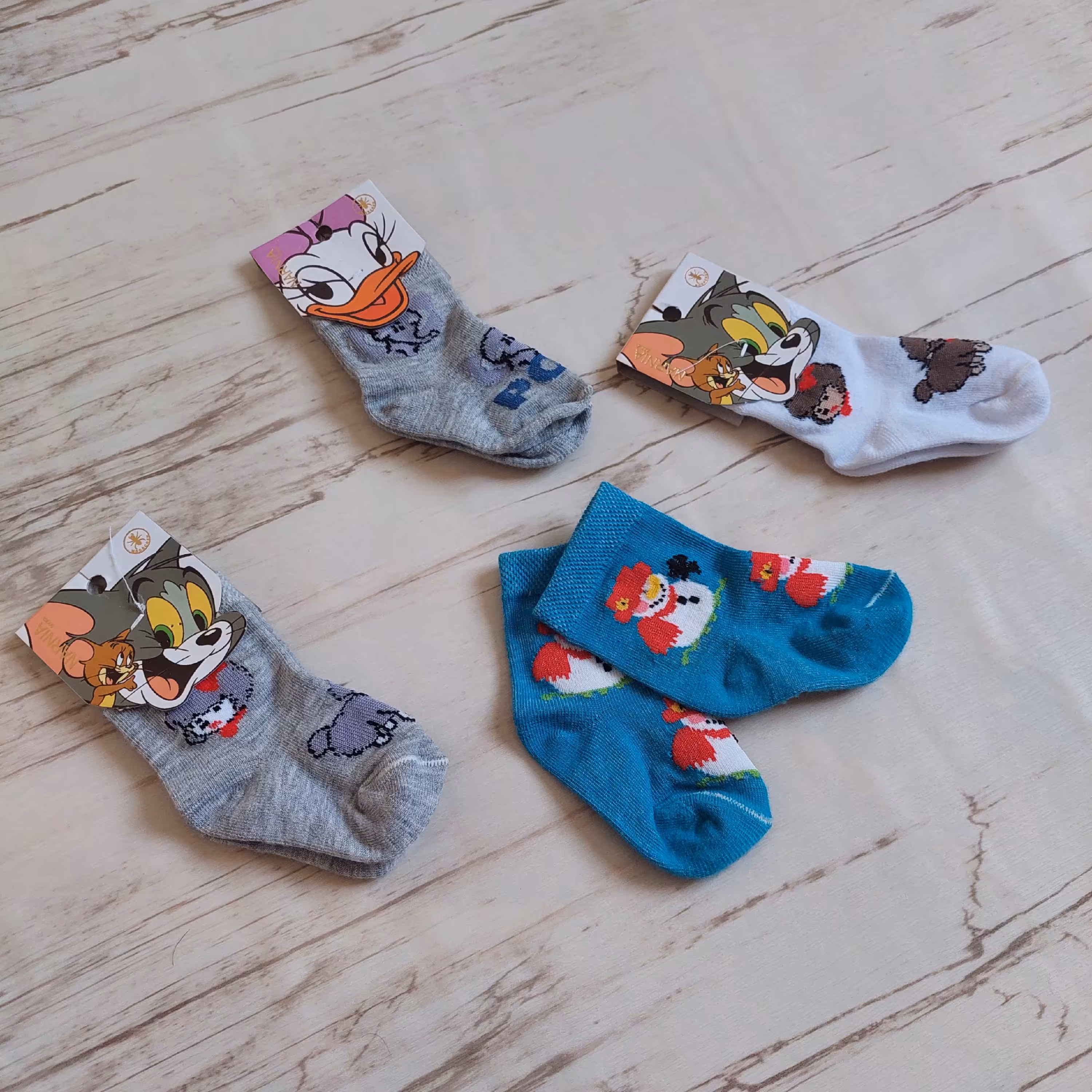 جوراب نخی نوزادی ساقدار  طرح کارتونی (فیل،آدم برفی، عروسکی )