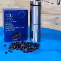 قهوه دان Camel-کمل 90ربوستا 10 عربیکا رست دارک در بسته بندی سوپاپ دار 200 گرمی. 