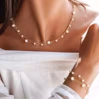 ست گردنبند و دستبند مروارید صدفی