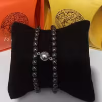 دستبند مگنتی ست زوج دوستی حدید گوی دودی