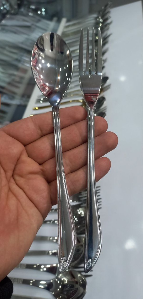 سرویس قاشق و چنگال 24 نفره یونیک دهنه اروپایی مدل دم کج