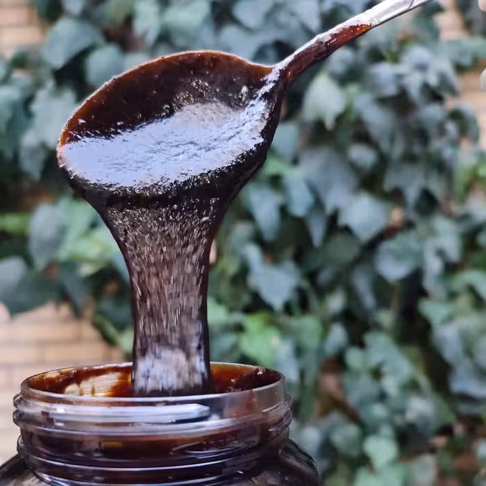 رب انار قجری خانگی درجه یک، طعم ملس، بسته‌بندی یک کیلویی