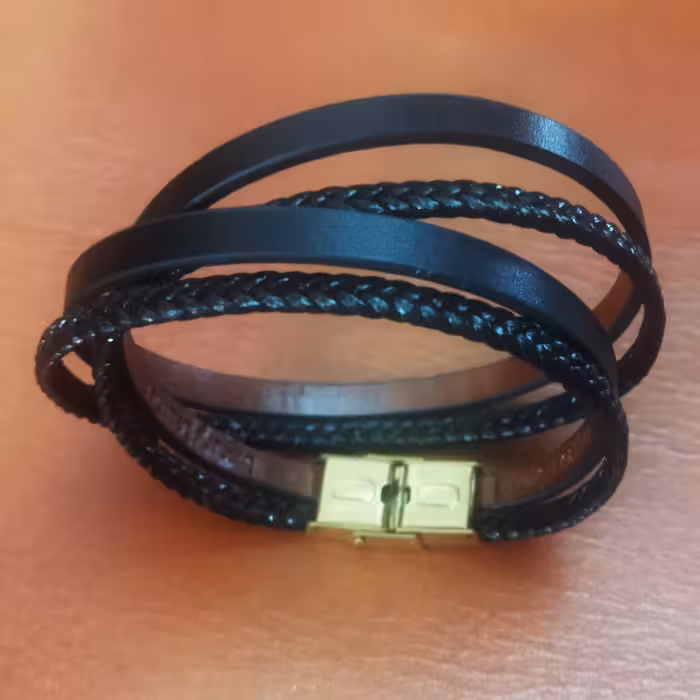 دستبند چرم طبیعی چهار ردیفه طرح بافت 