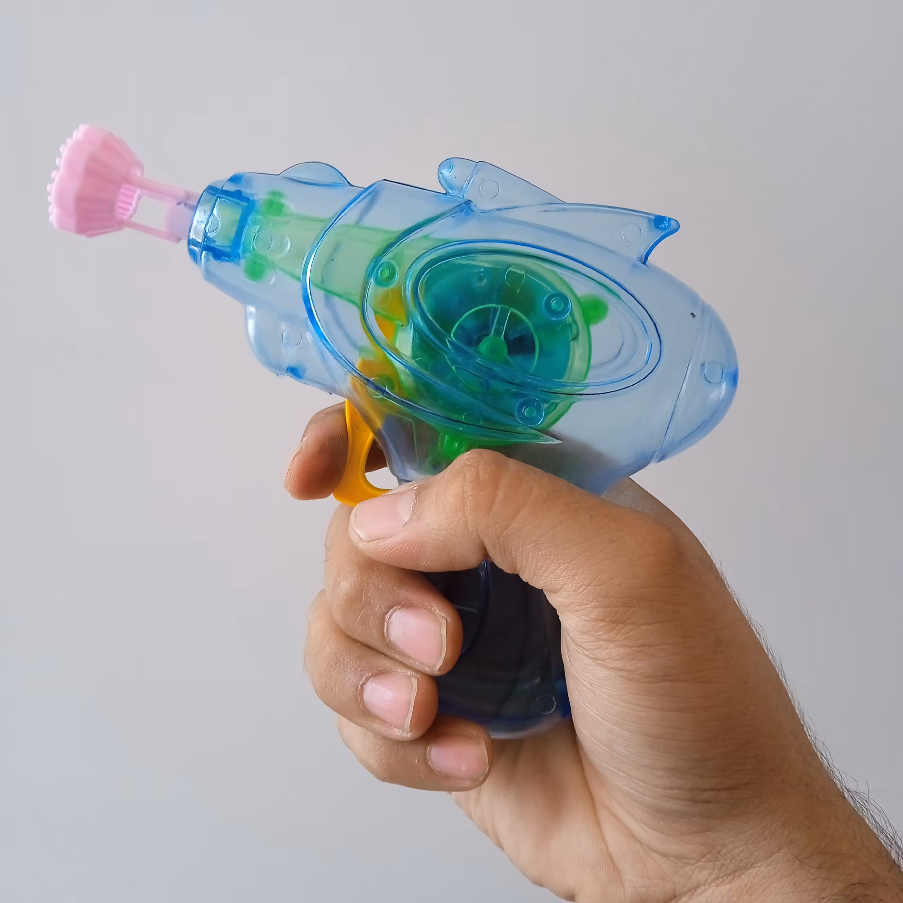 تفنگ حباب ساز چراغدار مکانیکی دارای ظرف مخصوص و مایع حباب ساز حباب ساز مکانیکی 