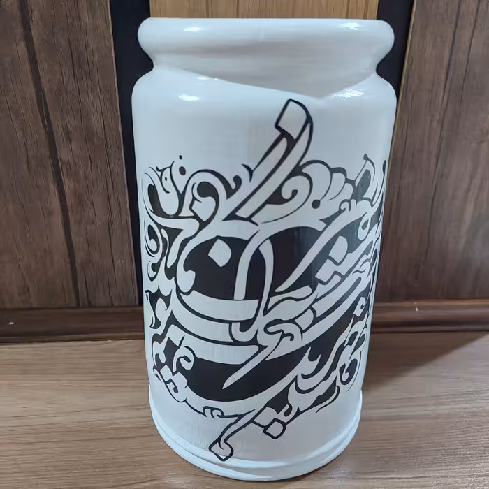 کوزه سفالی طرح خوشنویسی کاردست