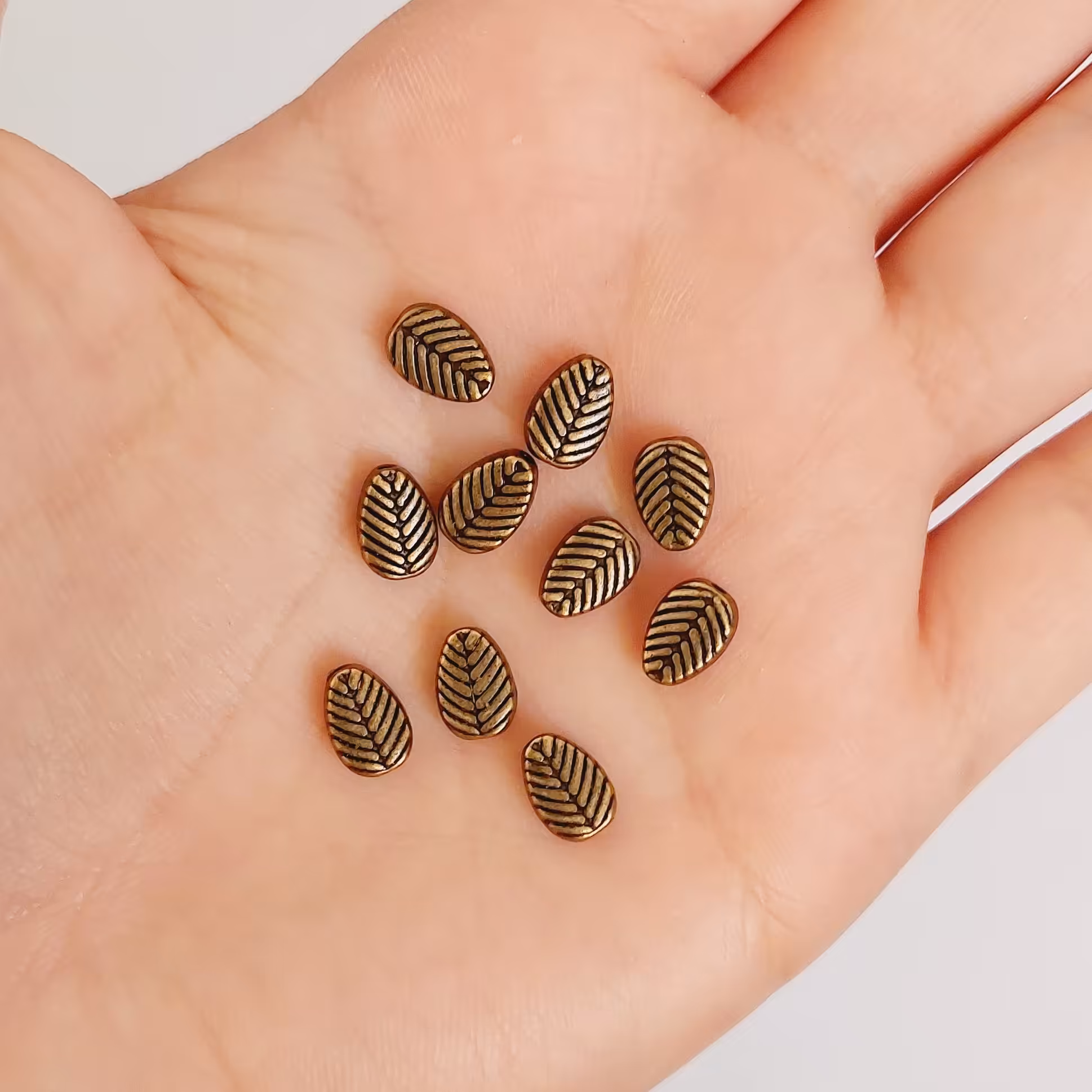 خرجکاربرنز 10گرمی برگ توکار(شامل14عدد)طول8میل