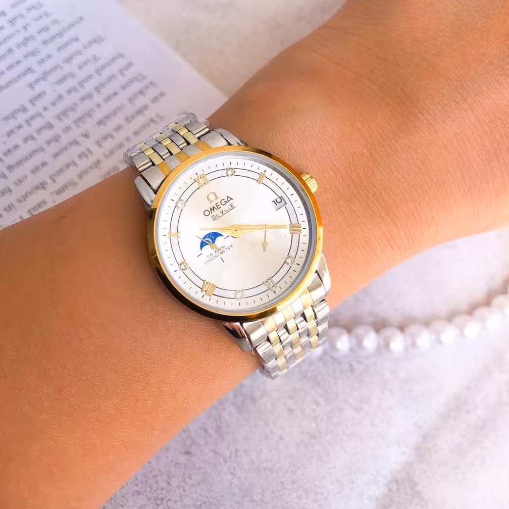  سایز زنانه یا  مردانه با فروشنده هماهنگ شود ساعت زنانه یا مردانه بصورت تک   مارک امگا بنداستیل دورنگ صفحه سفید