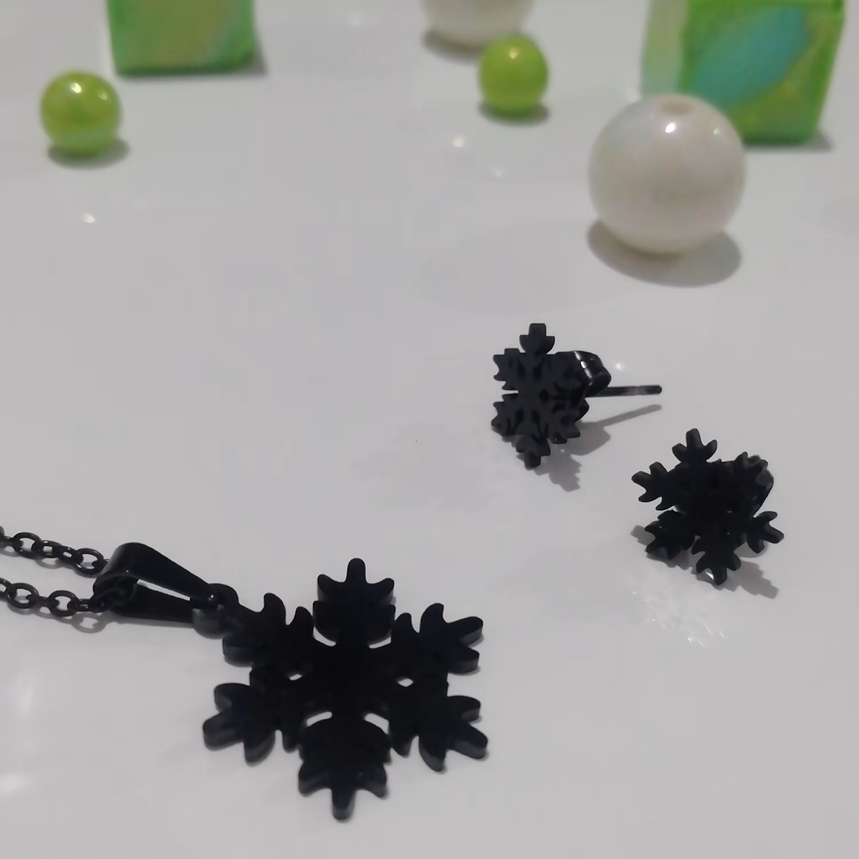 نیم ست استیل مشکی زنجیردار طرح دونه برف