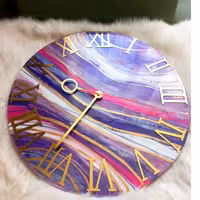 ساعت دیواری رزینی طرح ژئود 