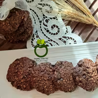 کوکی رژیمی جو و شکلات تلخ(پک 12عددی300 گرمی) هر عدد کوکی بین25تا30  گرم