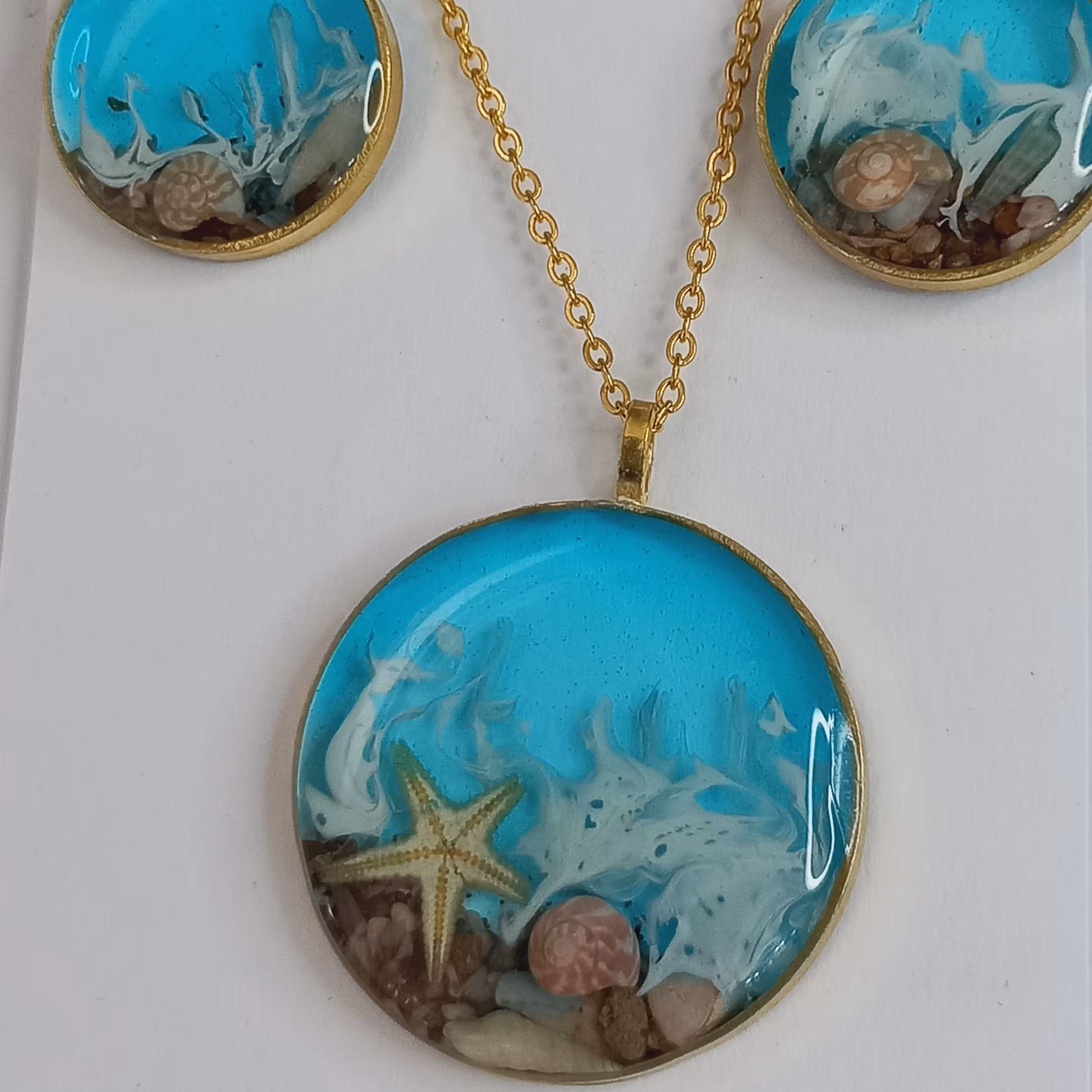 نیم ست دریای رزینی( گردنبند و گوشواره)