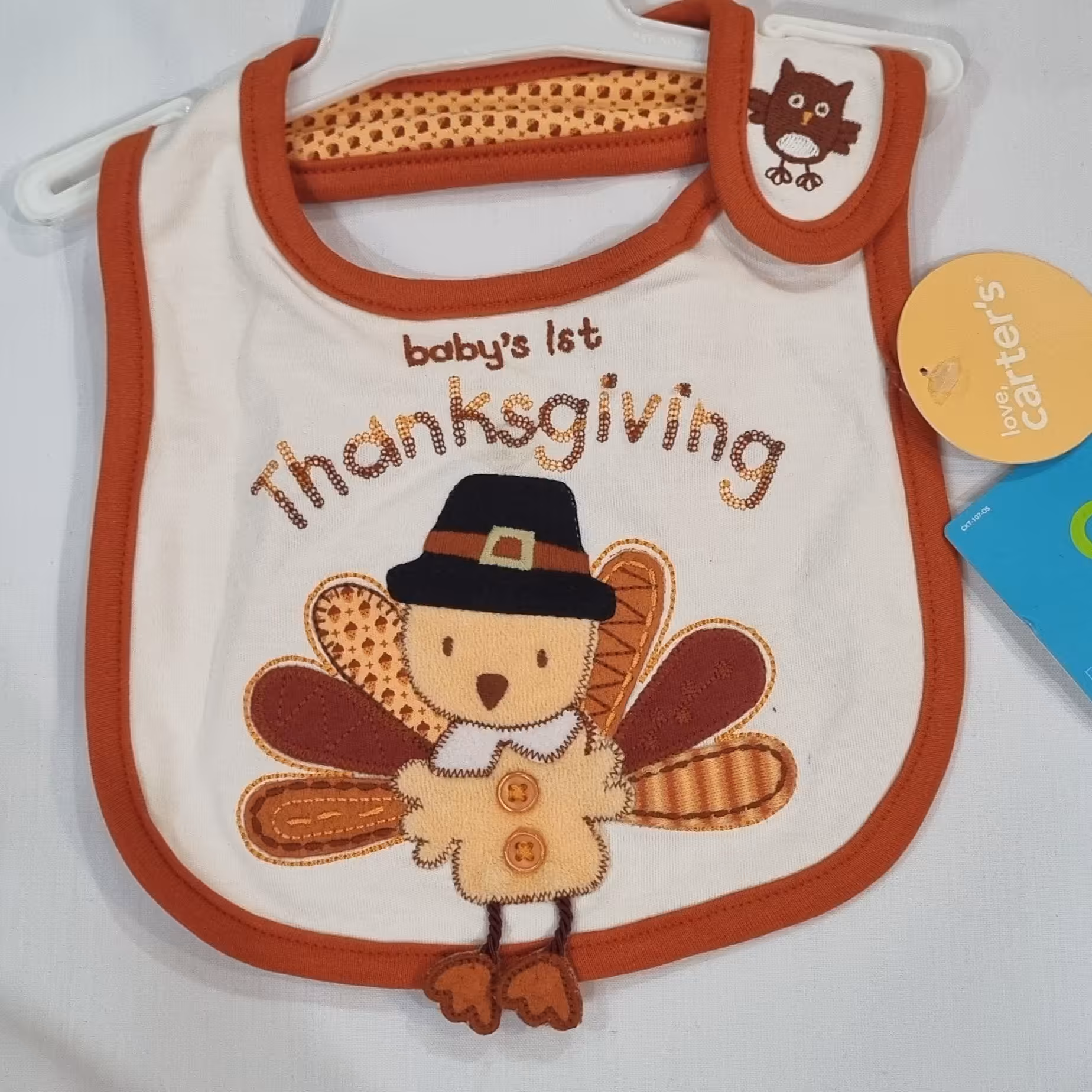 پیش بند نوزادی مناسب دختر و پسر رنگ نارنجی برند کارترز