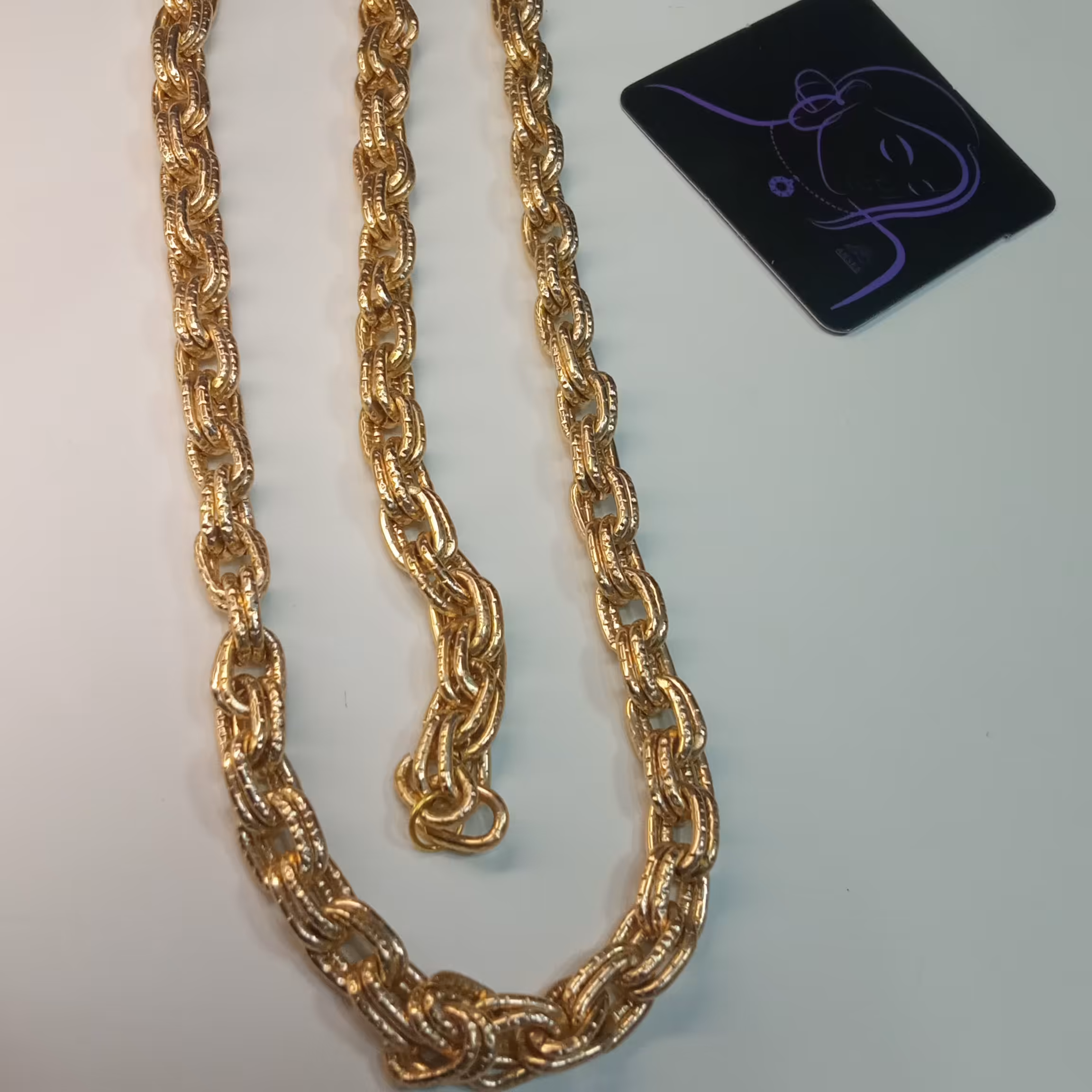 گردنبند و دستبند کارتیر نقش دار