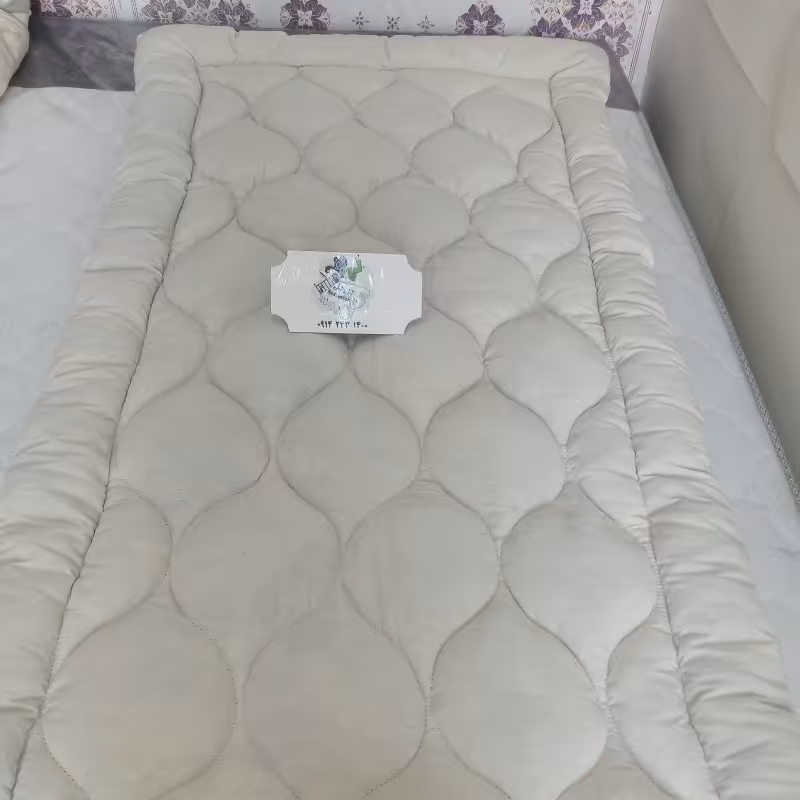 تشک طبی چرخ کاری شده با بهترین نوع پشم و متقال با وزن 3.5 کیلو و اندازه 90در 180