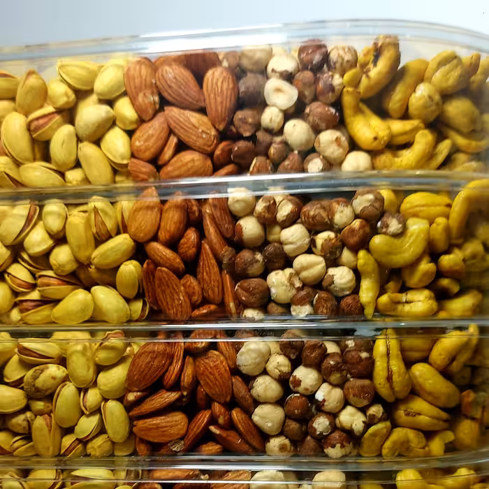 آجیل چهار مغز تهرون کادو نیم کیلویی ظرف پلی کریستال