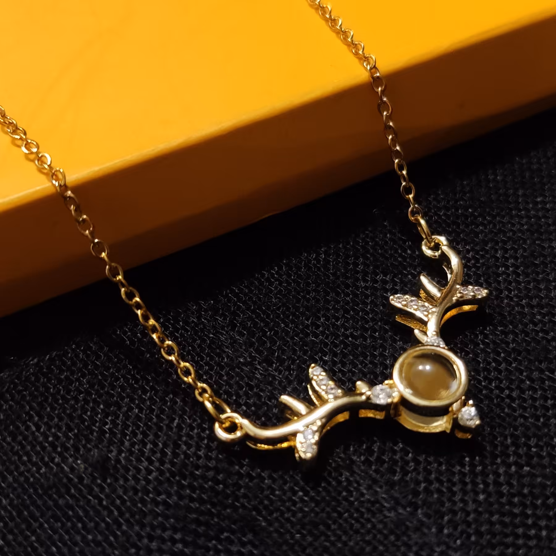 گردنبند تلسکوپی شاخ گوزن طلایی دوستت دارم به صدزبان دنیا کد 02