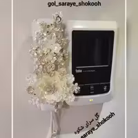 گل کریستالی مخصوص تزئین آیفون، بسیار زیبا و پرکار، رنگ صدفی و لب طلایی.