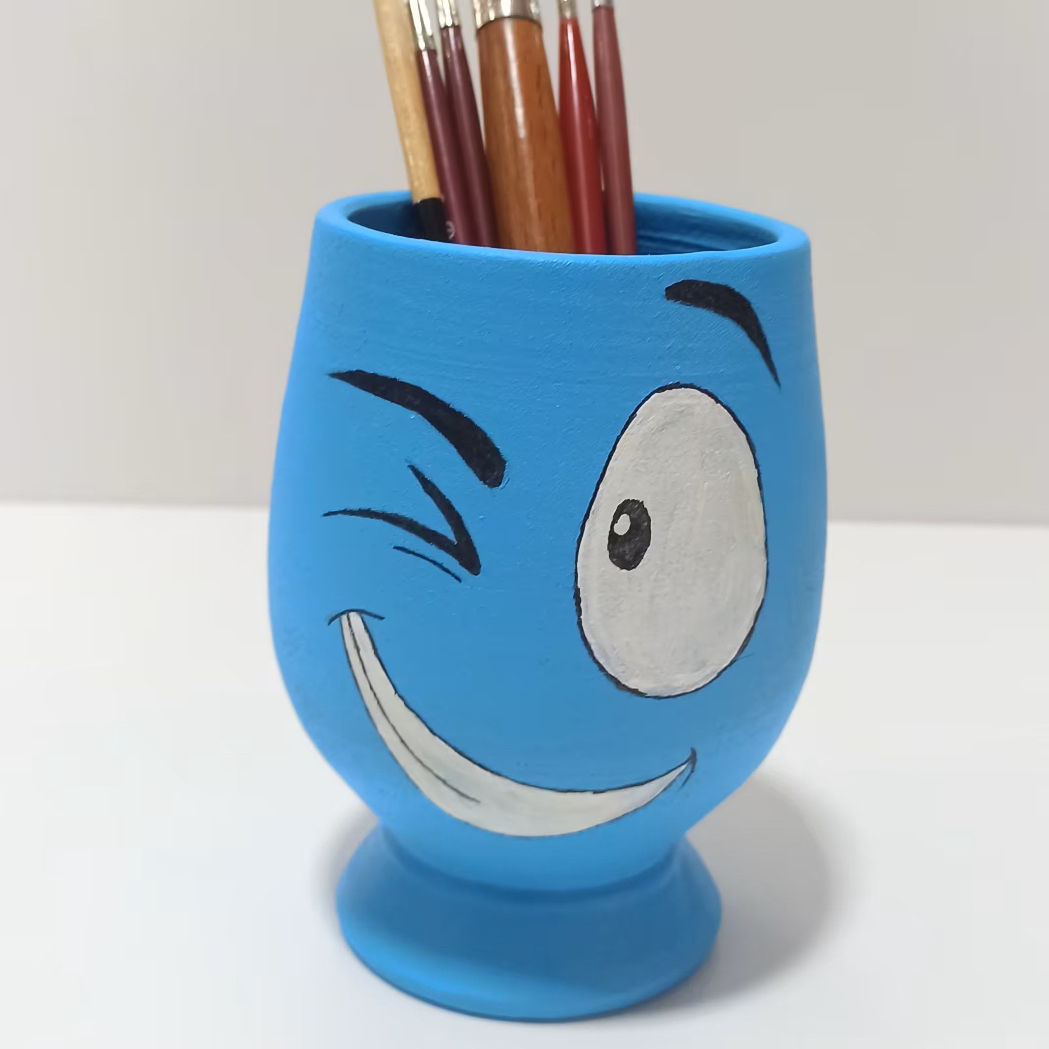 جاقلمی پایه دار سفالی طرح لبخند